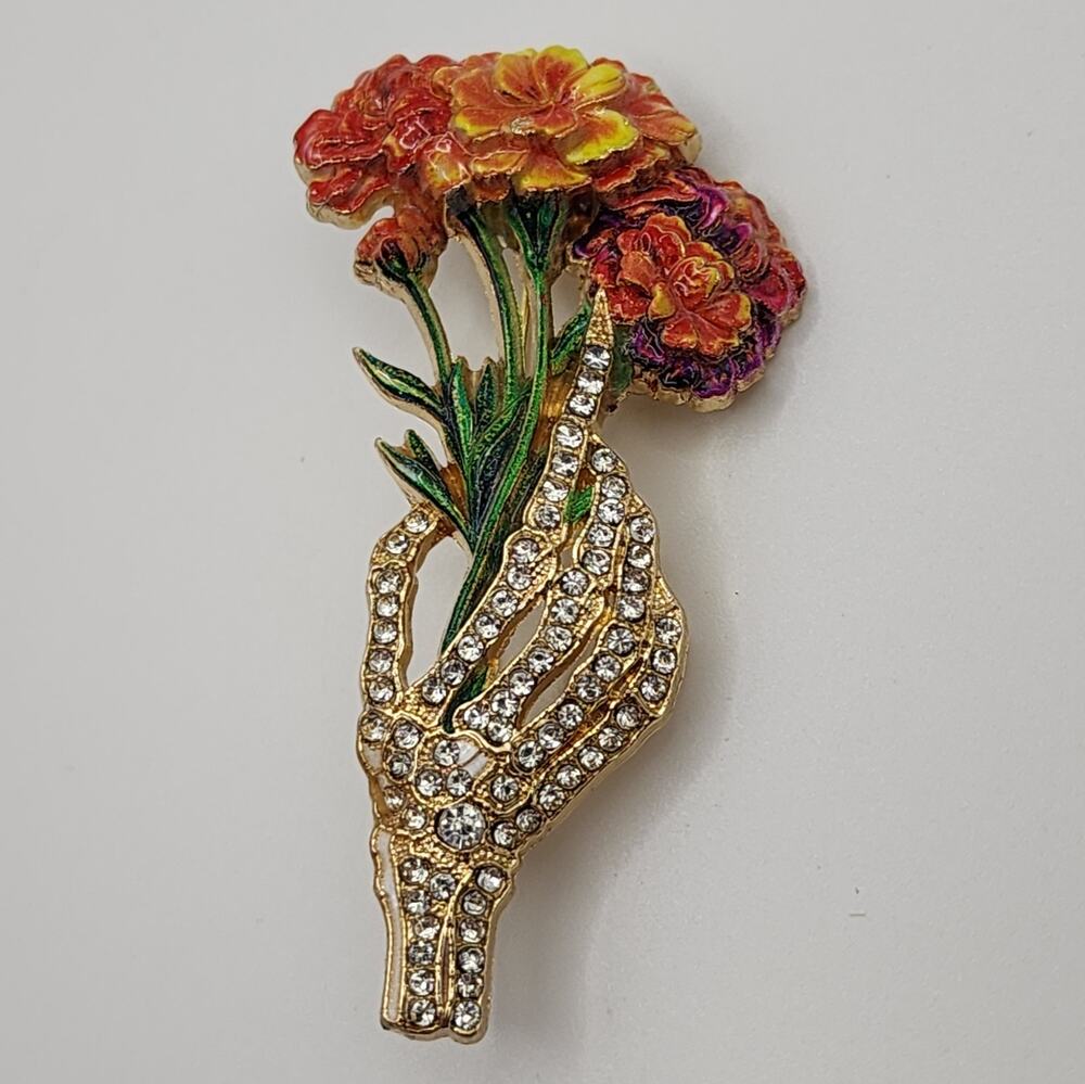 Rhinestone Encrusted Hand Holding Enamel Bouquet of Flowers